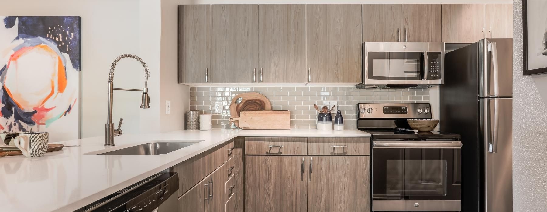 a kitchen with stainless steel appliances