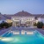 a swimming pool in front of a house