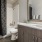 a bathroom with a large mirror