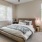 a bedroom with a bed and a fan